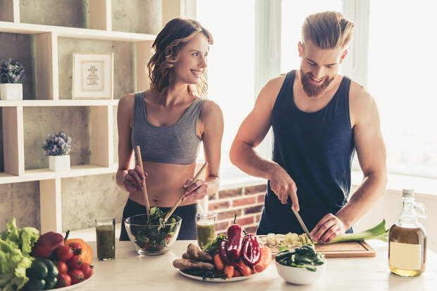 Beautiful,Young,Sports,People,Are,Talking,And,Smiling,While,Cooking