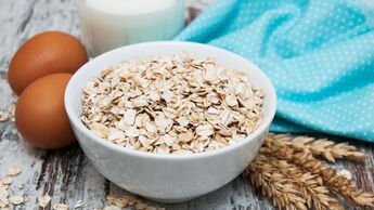 Bowl,Of,Oats,On,A,Old,Wooden,Background