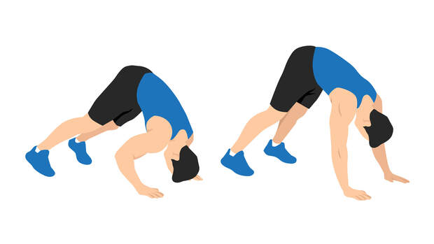 Man,Doing,Dive,Bomber,Push,Ups,In,The,Outdoor,Gym