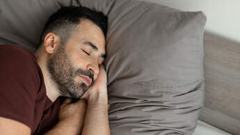 Man,Napping,Holding,Hands,Behind,Head,Sleeping,On,Side,,Lying