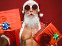 Sexy sportlicher Santa mit Geschenken