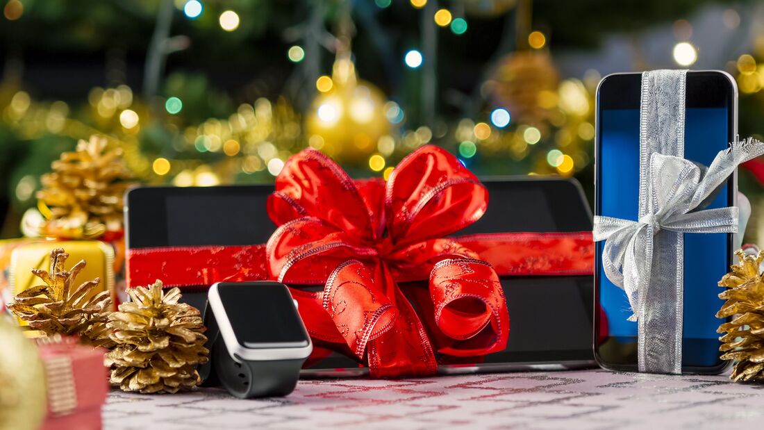 Tablet,Pc,,Smartphone,And,Smartwatch,With,Gifts,And,Decorations,In